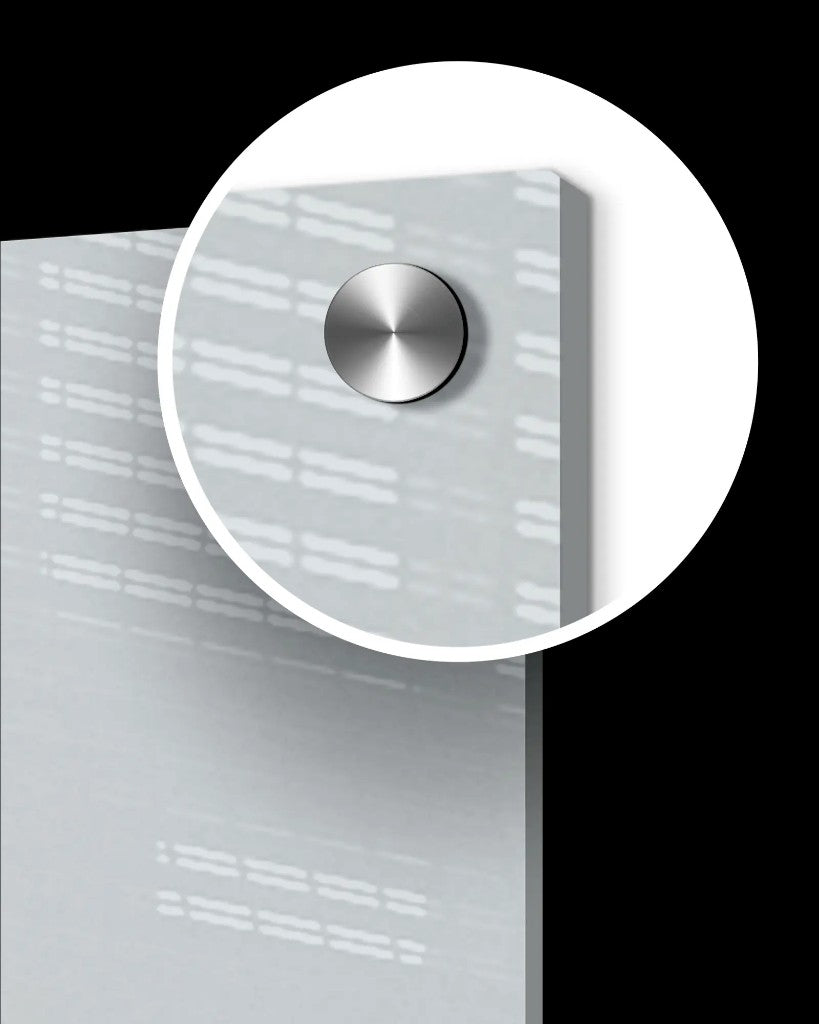 Magnified corner of an acrylic print showing thickness and a metal standoff