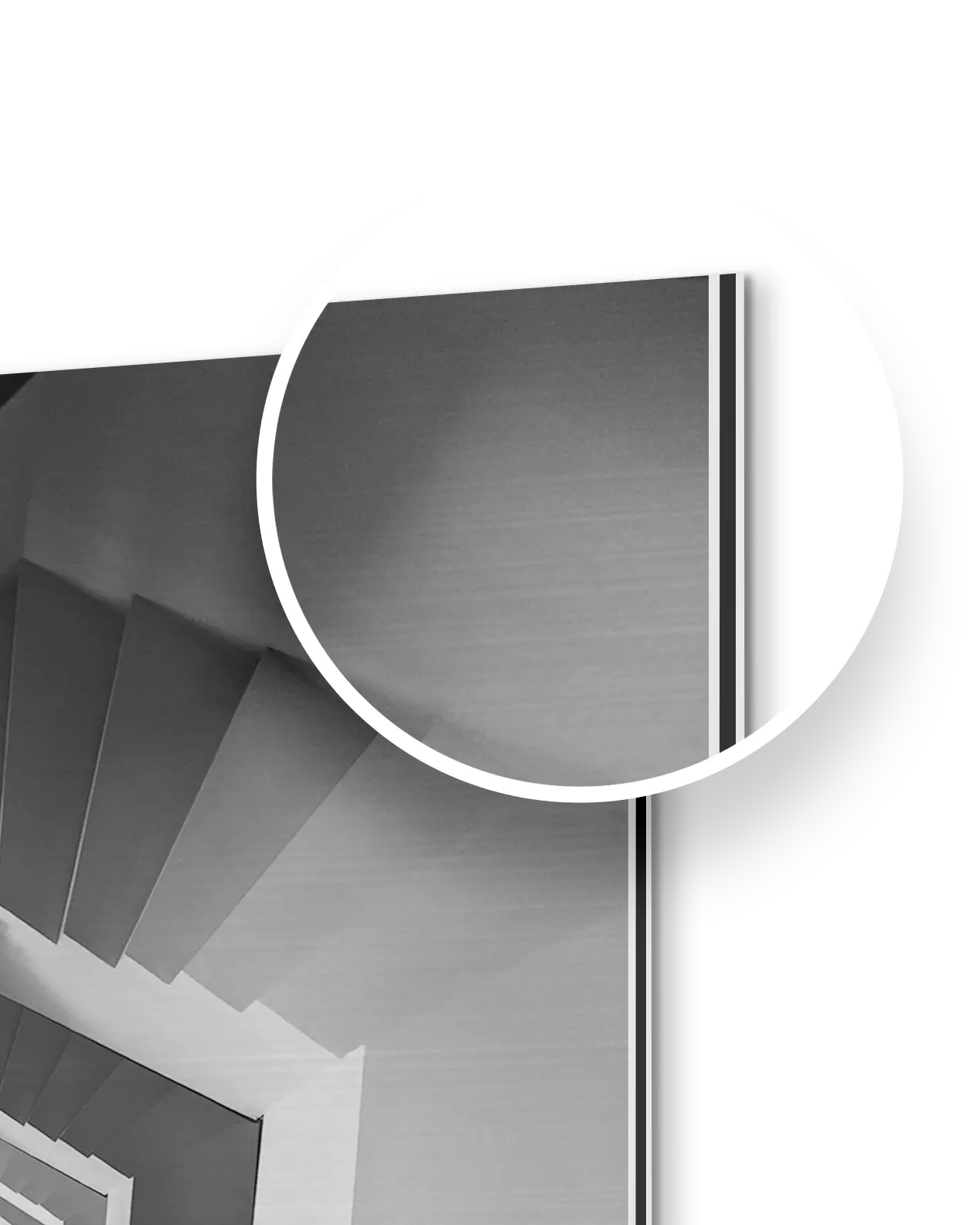 Magnified corner of a metal print showing the thin sandwich edge and surface grain