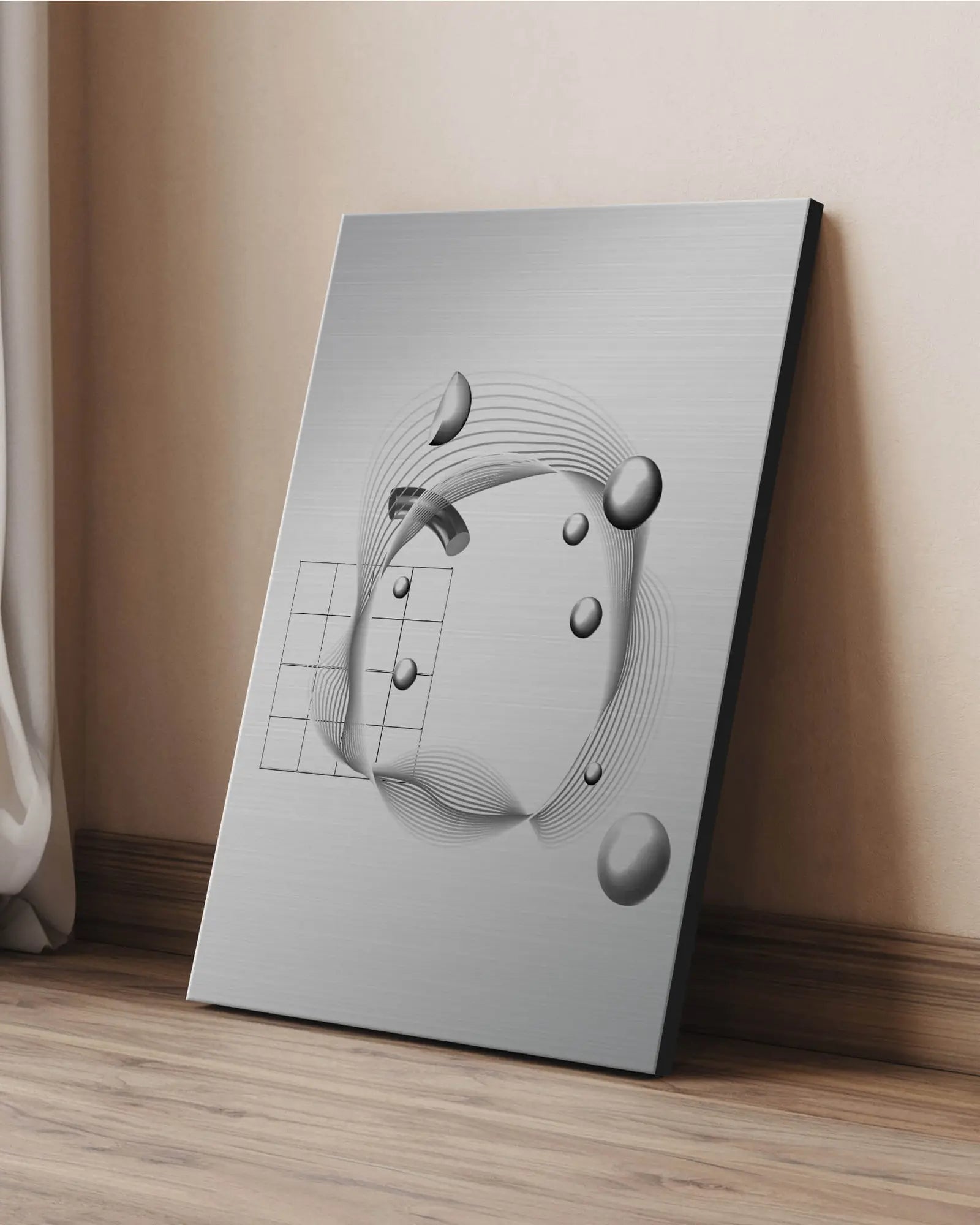 Brushed metal print leaning against a wall in a living space