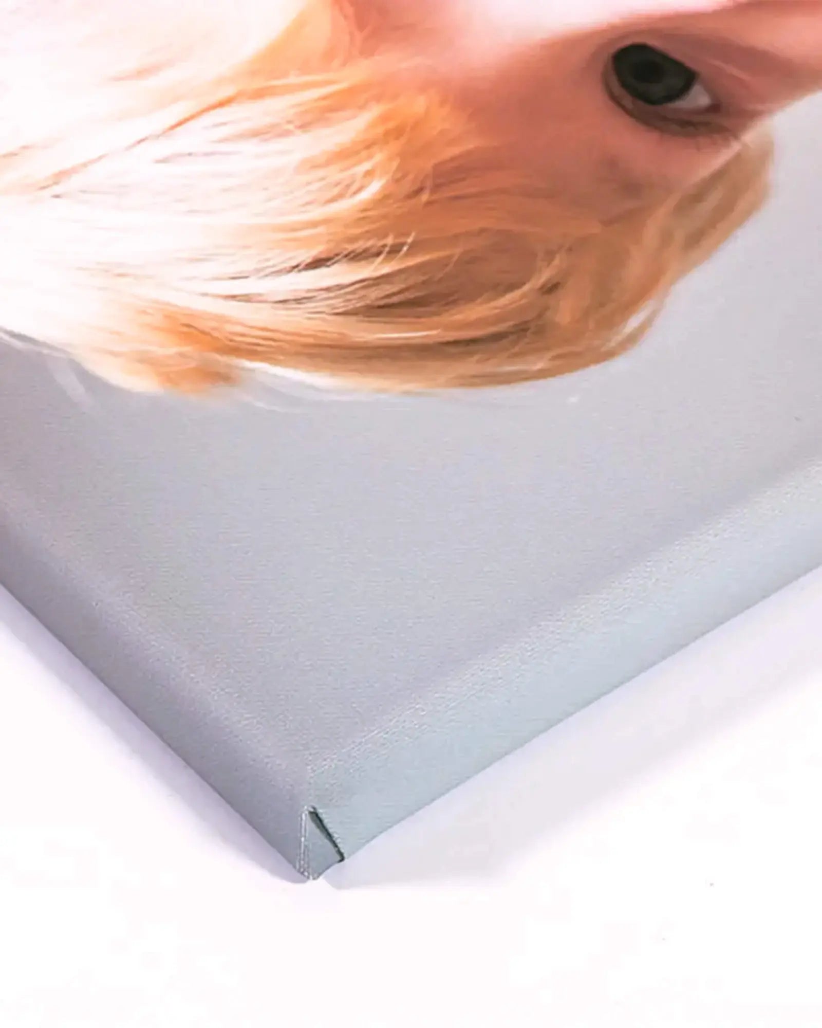 Close-up of a stretched canvas corner showing the gallery wrap fold
