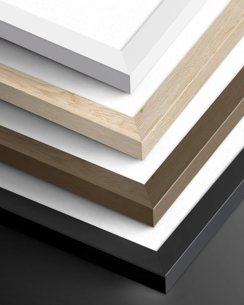 Four stacked wooden frame corners in white, natural wood, dark wood and black