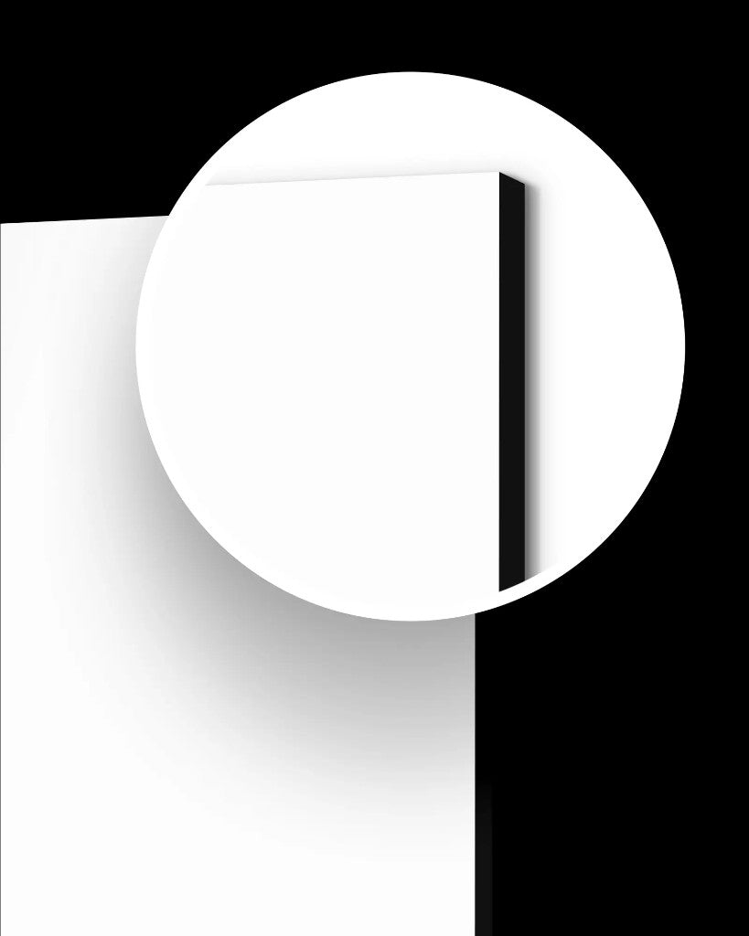 White foam board with a black edge and a magnified corner showing the foam core