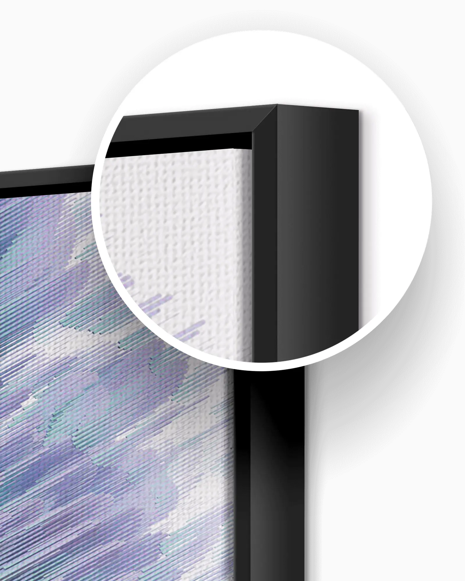 Magnified corner of a black floating frame showing canvas weave
